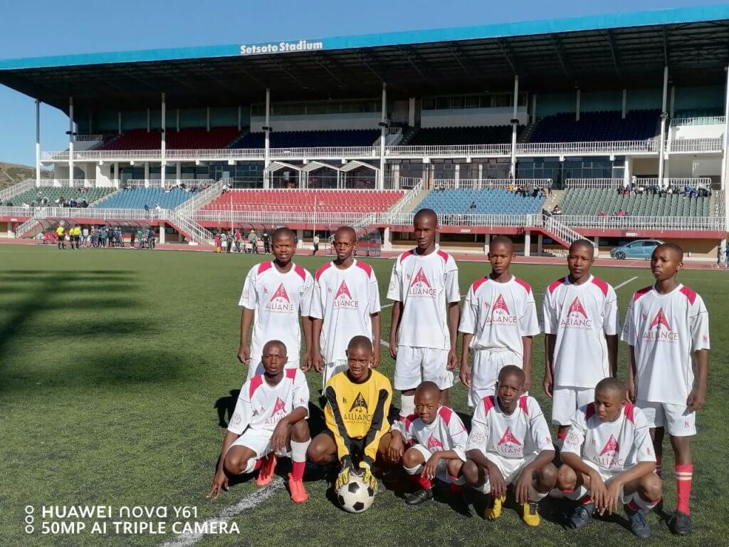 SHHS Junior Soccer Team at the National Stadium in Maseru